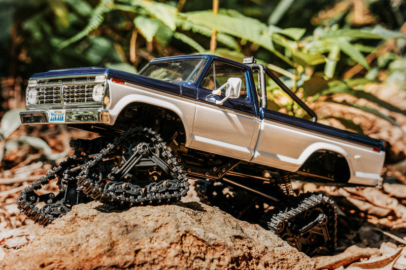 FMS scale RC crawler fitted with four BATRAZZI all-terrain tracks